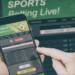 Hogan Pressures Gaming Commission To Launch Mobile Betting ‘Immediately